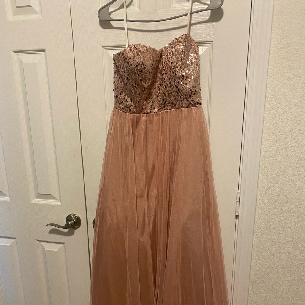 Lovely Light peach special occasion dress. Regular length. Great for prom.